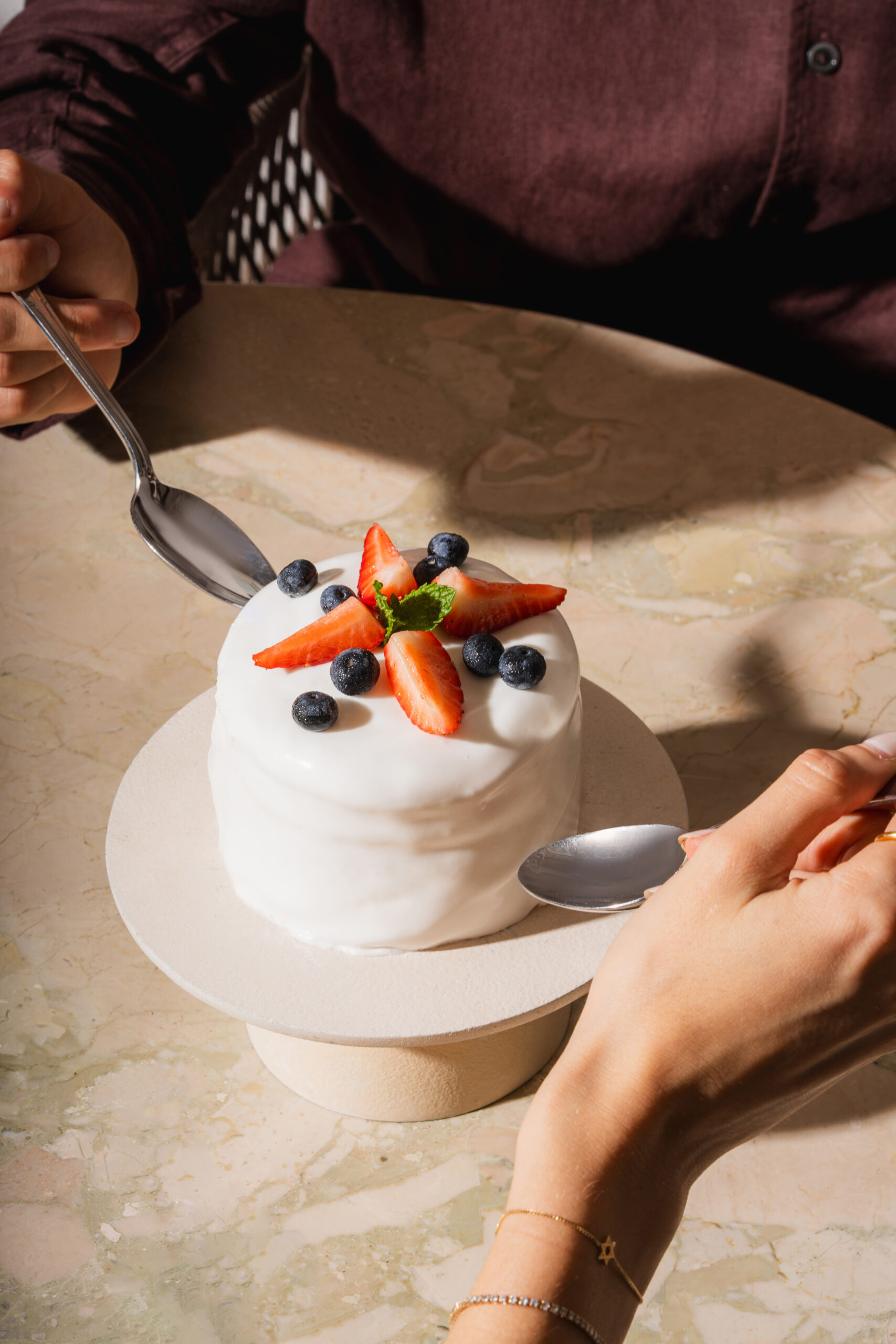 Couple enjoying a romantic dinner with pasta and seafood at Donatella Restaurant, the ideal choice for Valentine's Day in Miami Beach