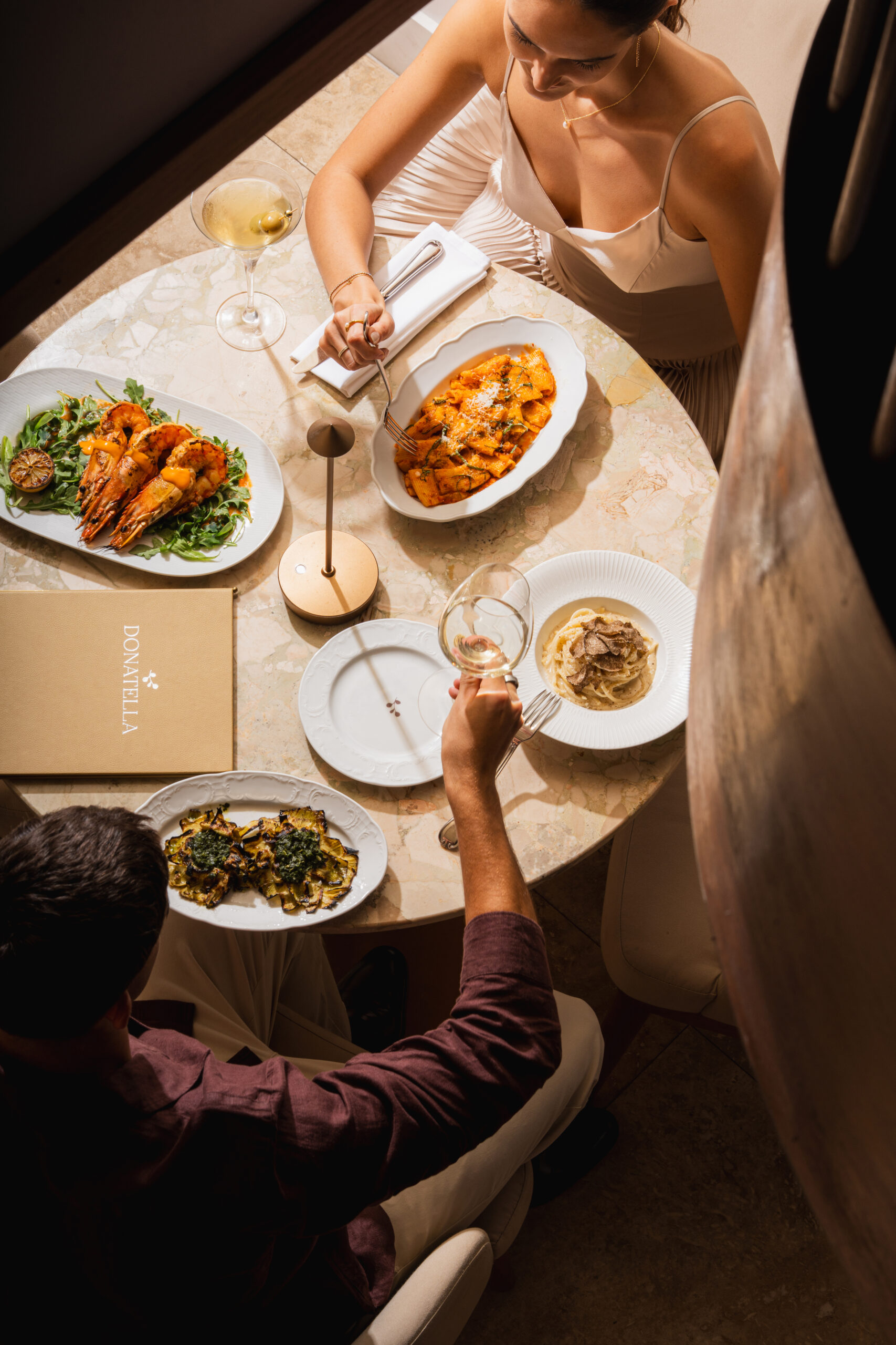 Couple sharing dessert at donatella restaurant